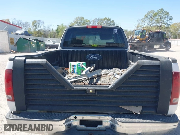 2003 Ford F-150 XL with VIN 1FTRX17L03NA16778, listed as a IAAI auction lot 41602179 with 219,101 mi miles. Bid and sale history available at carsss.com. Image 8.