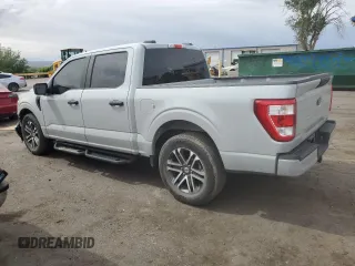 2023 Ford F-150 XL with VIN 1FTEW1CP2PFC13963, listed as a Copart auction lot 56045545 with 26,619 mi miles and Salvage title. Bid and sale history available at DreamBid. Image 2.