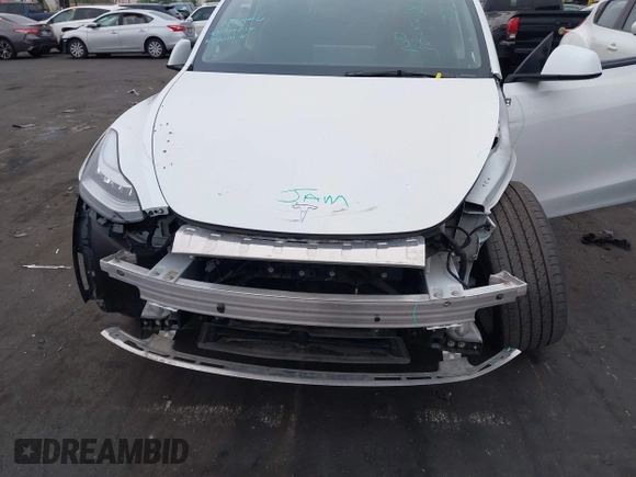 2023 Tesla Model Y Long Range z VIN 7SAYGDEE5PA063097, wystawiony jako IAAI lot #42171871 z przebiegiem Nie podano mil oraz . Historia ofert i sprzedaży dostępna na DreamBid. Obrazek 10.