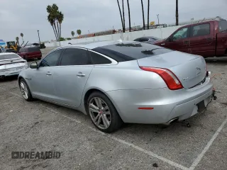 2014 Jaguar XJ Portfolio with VIN SAJWJ2GD2E8V62696, listed as a Copart auction lot 76620494 with 85,487 mi miles and Salvage title. Bid and sale history available at DreamBid. Image 2.