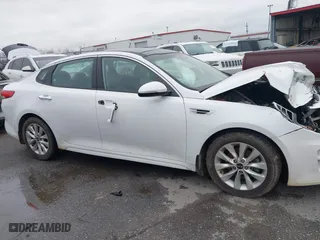 2016 Kia Optima EX with VIN 5XXGU4L30GG120518, listed as a IAAI auction lot 41602190 with 116,268 mi miles. Bid and sale history available at carsss.com. Image 13.