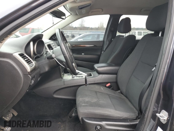 2013 Jeep Grand Cherokee Laredo with VIN 1C4RJFAG6DC630354, listed as a Copart auction lot 49773425 with 113,291 mi miles and Salvage Title. Bid and sale history available at carsss.com. Image 7.