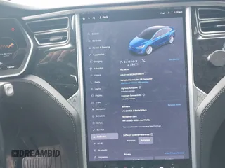 2016 Tesla Model X 70D with VIN 5YJXCBE20GF016173, listed as a IAAI auction lot 41809725 with 116,198 mi miles. Bid and sale history available at carsss.com. Image 18.