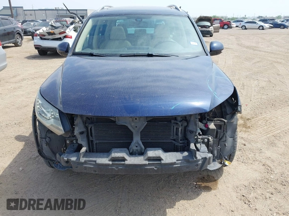 2012 Volkswagen Tiguan SEL with VIN WVGAV7AX8CW536752, listed as a IAAI auction lot 41798619 with 128,223 mi miles and . Bid and sale history available at DreamBid. Image 12.