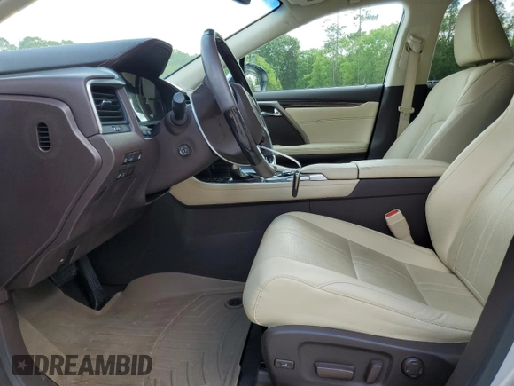 2016 Lexus RX 450h with VIN 2T2BGMCA3GC006421, listed as a Copart auction lot 51910465 with 86,465 mi miles and Salvage Title. Bid and sale history available at DreamBid. Image 7.