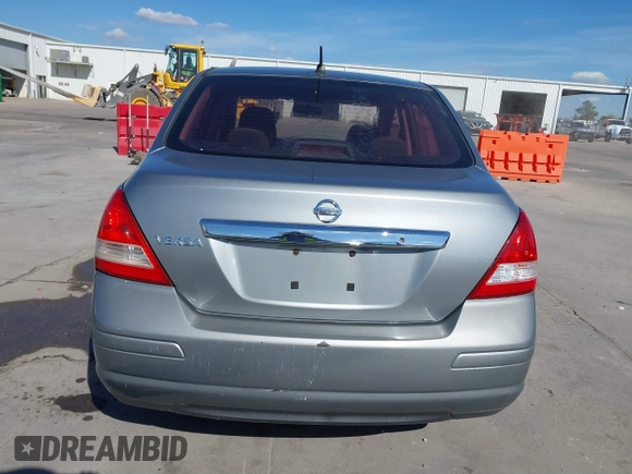 2010 Nissan Versa S with VIN 3N1BC1AP2AL394996, listed as a IAAI auction lot 40690760 with 125,972 mi miles and . Bid and sale history available at DreamBid. Image 17.