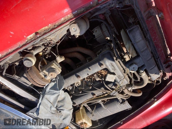 1981 Alfa Romeo Spider Veloce z VIN ZARBA5410B1012836, wystawiony jako IAAI lot #42364544 z przebiegiem Nie podano mil oraz . Historia ofert i sprzedaży dostępna na DreamBid. Obrazek 9.