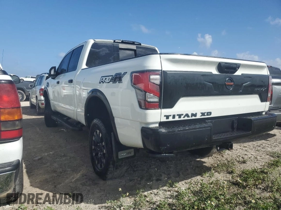 2021 Nissan Titan SV z VIN 1N6AA1FB2MN514566, wystawiony jako Copart lot #75194294 z przebiegiem 34 987 mil mil oraz Nie do naprawy • Non repairable. Historia ofert i sprzedaży dostępna na DreamBid. Obrazek 2.