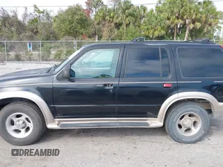 2000 Ford Explorer Eddie Bauer z VIN 1FMZU64EXYZA74923, wystawiony jako IAAI lot #41504088 z przebiegiem 254 021 mil mil oraz . Historia ofert i sprzedaży dostępna na DreamBid. Obrazek 14.