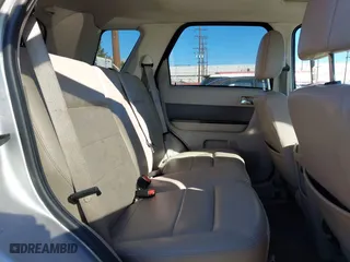 2009 Ford Escape Hybrid with VIN 1FMCU49389KA14781, listed as a IAAI auction lot 41409142 with 155,728 mi miles. Bid and sale history available at carsss.com. Image 8.