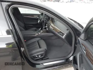 2019 BMW 5 Series 530i with VIN WBAJA5C58KWW11641, listed as a IAAI auction lot 41946359 with 48,635 mi miles and . Bid and sale history available at DreamBid. Image 5.