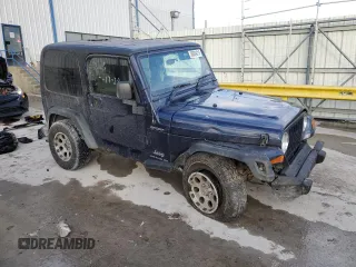 2006 Jeep Wrangler Sport Right Hand Drive with VIN 1J4F449S16P741407, listed as a Copart auction lot 88804015 with 182,059 mi miles and Salvage Title. Bid and sale history available at carsss.com. Image 4.