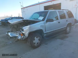 1996 Chevrolet Tahoe with VIN 1GNEK13R3TJ318572, listed as a IAAI auction lot 41419555 with 199,201 mi miles. Bid and sale history available at carsss.com. Image 2.