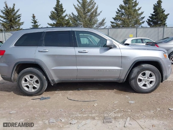 2014 Jeep Grand Cherokee Laredo with VIN 1C4RJFAG7EC243121, listed as a IAAI auction lot 41925695 with 147,999 mi miles. Bid and sale history available at carsss.com. Image 13.