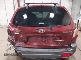 2003 Hyundai Santa Fe GLS with VIN KM8SC73D63U368408, listed as a IAAI auction lot 41514597 with 137,895 mi miles. Bid and sale history available at carsss.com. Image 17.