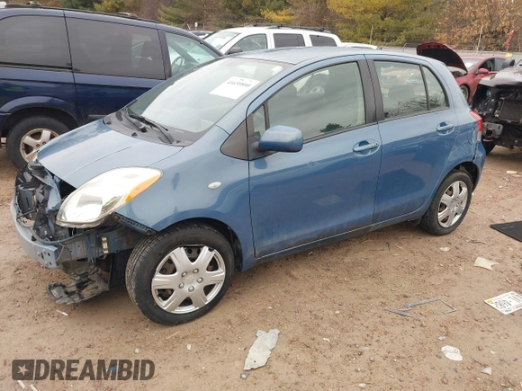2009 Toyota Yaris with VIN JTDKT903195255240, listed as a IAAI auction lot 41650800 with 168,991 mi miles. Bid and sale history available at carsss.com. Image 17.