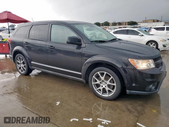 2013 Dodge Journey R/T with VIN 3C4PDCEG2DT500101, listed as a Copart auction lot 54759275 with 140,814 mi miles and Salvage title. Bid and sale history available at DreamBid. Image 4.