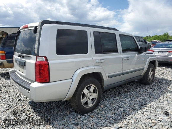 2009 Jeep Commander Sport with VIN 1J8HH48K89C540189, listed as a Copart auction lot 52552235 with 258,377 mi miles and Salvage title. Bid and sale history available at DreamBid. Image 3.