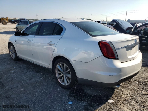 2012 Lincoln MKS with VIN 1LNHL9DR0CG802997, listed as a Copart auction lot 72217704 with 186,296 mi miles and Salvage Title. Bid and sale history available at carsss.com. Image 2.