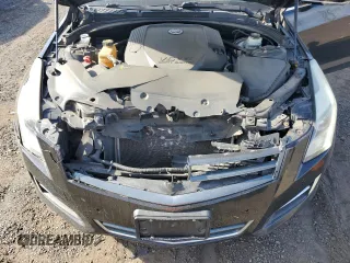 2013 Cadillac ATS Performance z VIN 1G6AJ5S36D0122926, wystawiony jako Copart lot #78393634 z przebiegiem 162 061 mil mil oraz Szkody całkowita. Historia ofert i sprzedaży dostępna na DreamBid. Obrazek 12.