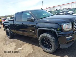 2017 GMC Sierra 1500 SLE z VIN 1GTV2MEC2HZ105964, wystawiony jako IAAI lot #42091941 z przebiegiem 93 779 mil mil oraz . Historia ofert i sprzedaży dostępna na DreamBid. Obrazek 13.