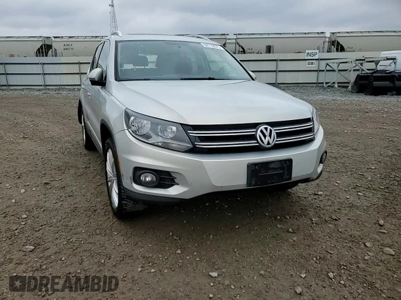 2013 Volkswagen Tiguan SE z VIN WVGBV3AX1DW579506, wystawiony jako Copart lot #52719575 z przebiegiem 163 471 mil mil oraz Szkoda całkowita • Salvage title. Historia ofert i sprzedaży dostępna na DreamBid. Obrazek 12.