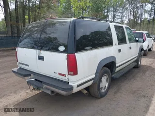 1999 GMC Suburban with VIN 1GKFK16R4XJ798754, listed as a IAAI auction lot 41998578 with 266,899 mi miles. Bid and sale history available at carsss.com. Image 4.