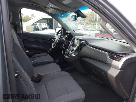 2018 Chevrolet Tahoe LS with VIN 1GNSCAEC2JR306131, listed as a IAAI auction lot 42338873 with 107,652 mi miles and . Bid and sale history available at DreamBid. Image 5.