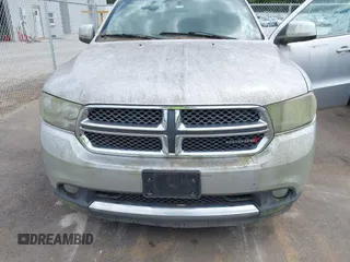 2013 Dodge Durango SXT with VIN 1C4RDHAG4DC571663, listed as a IAAI auction lot 42769759 with 178,033 mi miles and . Bid and sale history available at DreamBid. Image 6.