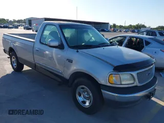 1999 Ford F-150 with VIN 1FTZF1727XKA60617, listed as a IAAI auction lot 41980403 with 98,481 mi miles and . Bid and sale history available at DreamBid. Image 1.