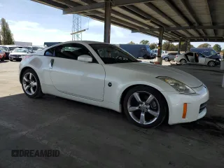 2006 Nissan 350Z Touring z VIN JN1AZ34D66M330951, wystawiony jako Copart lot #52898615 z przebiegiem 68 888 mil mil oraz Nie do naprawy • Non repairable. Historia ofert i sprzedaży dostępna na DreamBid. Obrazek 4.