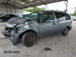 2000 Toyota Sienna LE with VIN 4T3ZF13C5YU226477, listed as a Copart auction lot 52970135 with 275,106 mi miles and Salvage title. Bid and sale history available at DreamBid. Image 1.