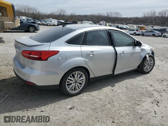 2017 Ford Focus Titanium with VIN 1FADP3J23HL347739, listed as a Copart auction lot 49385365 with 79,484 mi miles and Salvage title. Bid and sale history available at DreamBid. Image 3.