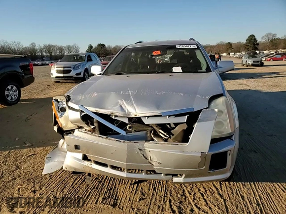 2009 Cadillac SRX RWD z VIN 1GYEE637890117173, wystawiony jako Copart lot #42098225 z przebiegiem 124 902 mil mil oraz Szkoda całkowita • Salvage title. Historia ofert i sprzedaży dostępna na DreamBid. Obrazek 11.