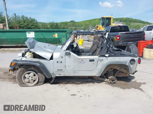 2006 Jeep Wrangler X with VIN 1J4FA39S36P703941, listed as a IAAI auction lot 42220361 with 148,829 mi miles and . Bid and sale history available at DreamBid. Image 14.