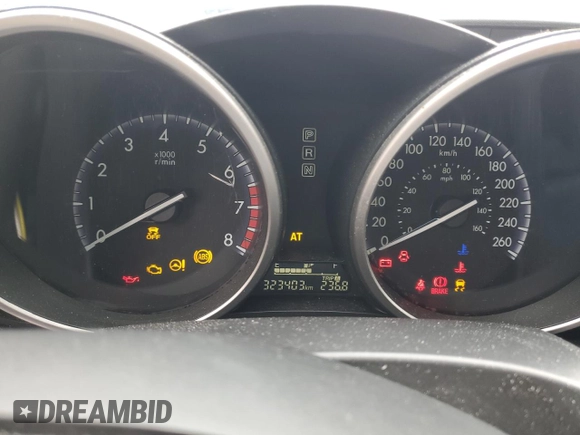 2012 Mazda 3 i Sport with VIN JM1BL1UF0C1597315, listed as a Copart auction lot 50304985 with 323,403 mi miles and Salvage Title. Bid and sale history available at DreamBid. Image 9.