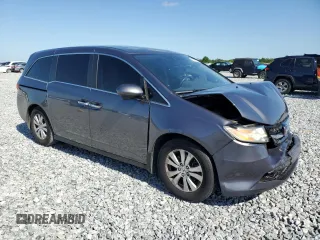 2016 Honda Odyssey EX-L with VIN 5FNRL5H6XGB104351, listed as a Copart auction lot 52507935 with 154,718 mi miles and Salvage Title. Bid and sale history available at DreamBid. Image 4.