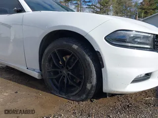 2016 Dodge Charger SXT with VIN 2C3CDXJG0GH175381, listed as a IAAI auction lot 41985221 with 119,507 mi miles. Bid and sale history available at carsss.com. Image 6.