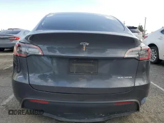 2021 Tesla Model Y Long Range with VIN 5YJYGDEE6MF200883, listed as a Copart auction lot 51707405 with 59,820 mi miles and Salvage Title. Bid and sale history available at DreamBid. Image 6.