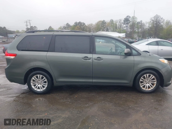 2013 Toyota Sienna XLE AAS with VIN 5TDYK3DC8DS401561, listed as a IAAI auction lot 41990044 with 214,111 mi miles and . Bid and sale history available at DreamBid. Image 13.