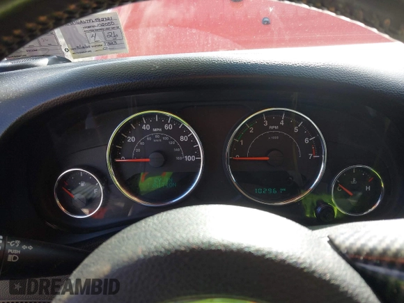 2015 Jeep Wrangler Sport with VIN 1C4AJWAG7FL582721, listed as a IAAI auction lot 41989505 with 102,961 mi miles. Bid and sale history available at carsss.com. Image 7.