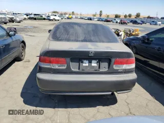 1999 Honda Civic DX with VIN 1HGEJ6227XL086048, listed as a Copart auction lot 69161104 with 139,789 mi miles and Clean Title. Bid and sale history available at carsss.com. Image 6.