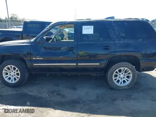 2000 Chevrolet New Tahoe LT with VIN 1GNEK13TXYJ191872, listed as a IAAI auction lot 41860033 with 1 mi miles. Bid and sale history available at carsss.com. Image 14.