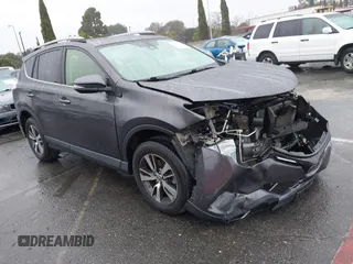2017 Toyota RAV4 XLE with VIN JTMWFREV9HJ136943, listed as a IAAI auction lot 41558088 with 94,915 mi miles. Bid and sale history available at carsss.com. Image 1.