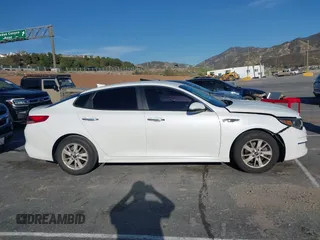 2016 Kia Optima LX z VIN 5XXGT4L34GG049312, wystawiony jako IAAI lot #41890581 z przebiegiem 142 360 mil mil oraz . Historia ofert i sprzedaży dostępna na DreamBid. Obrazek 12.
