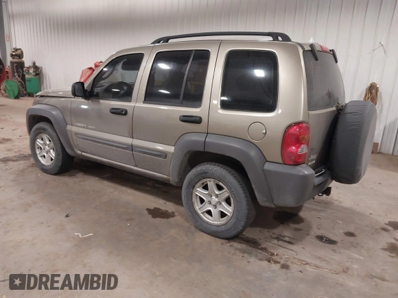 2003 Jeep Liberty Sport with VIN 1J4GL48K83W652993, listed as a IAAI auction lot 41086140 with 115,177 mi miles and . Bid and sale history available at DreamBid. Image 3.