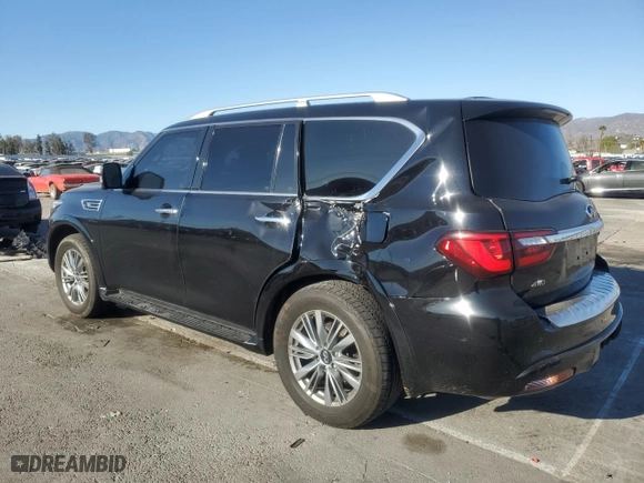 2021 Infiniti QX80 LUXE with VIN JN8AZ2AE7M9271353, listed as a Copart auction lot 47233415 with 76,521 mi miles and Salvage Title. Bid and sale history available at carsss.com. Image 2.