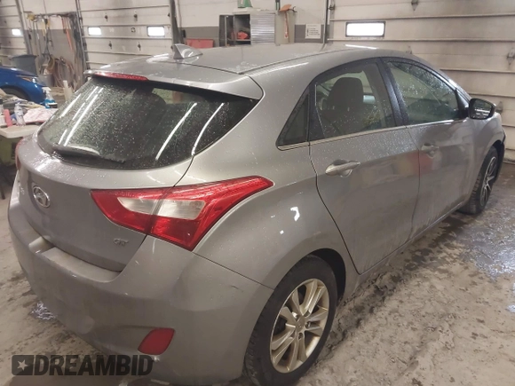 2013 Hyundai Elantra GT with VIN KMHD35LE6DU101924, listed as a IAAI auction lot 42032821 with 188,839 mi miles. Bid and sale history available at carsss.com. Image 4.