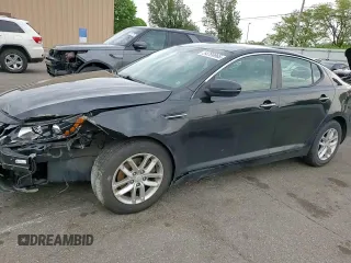 2013 Kia Optima LX z VIN 5XXGM4A73DG236538, wystawiony jako Copart lot #54799965 z przebiegiem 176 640 mil mil oraz Szkoda całkowita • Salvage title. Historia ofert i sprzedaży dostępna na DreamBid. Obrazek 13.