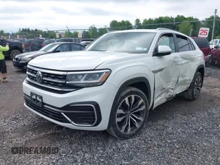 2021 Volkswagen Atlas SEL z VIN 1V2SE2CA7MC214805, wystawiony jako IAAI lot #42374591 z przebiegiem 61 775 mil mil oraz . Historia ofert i sprzedaży dostępna na DreamBid. Obrazek 18.